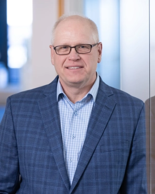 portrait of a smiling person in professional attire